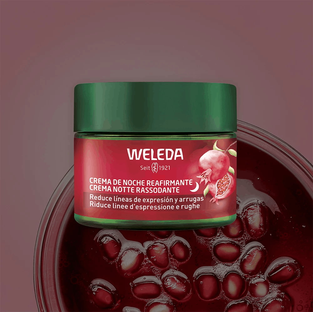 Creme noturno firmador da Weleda de romã, ajuda a reduzir linhas de expressão e rugas, em embalagem elegante e vibrante.
